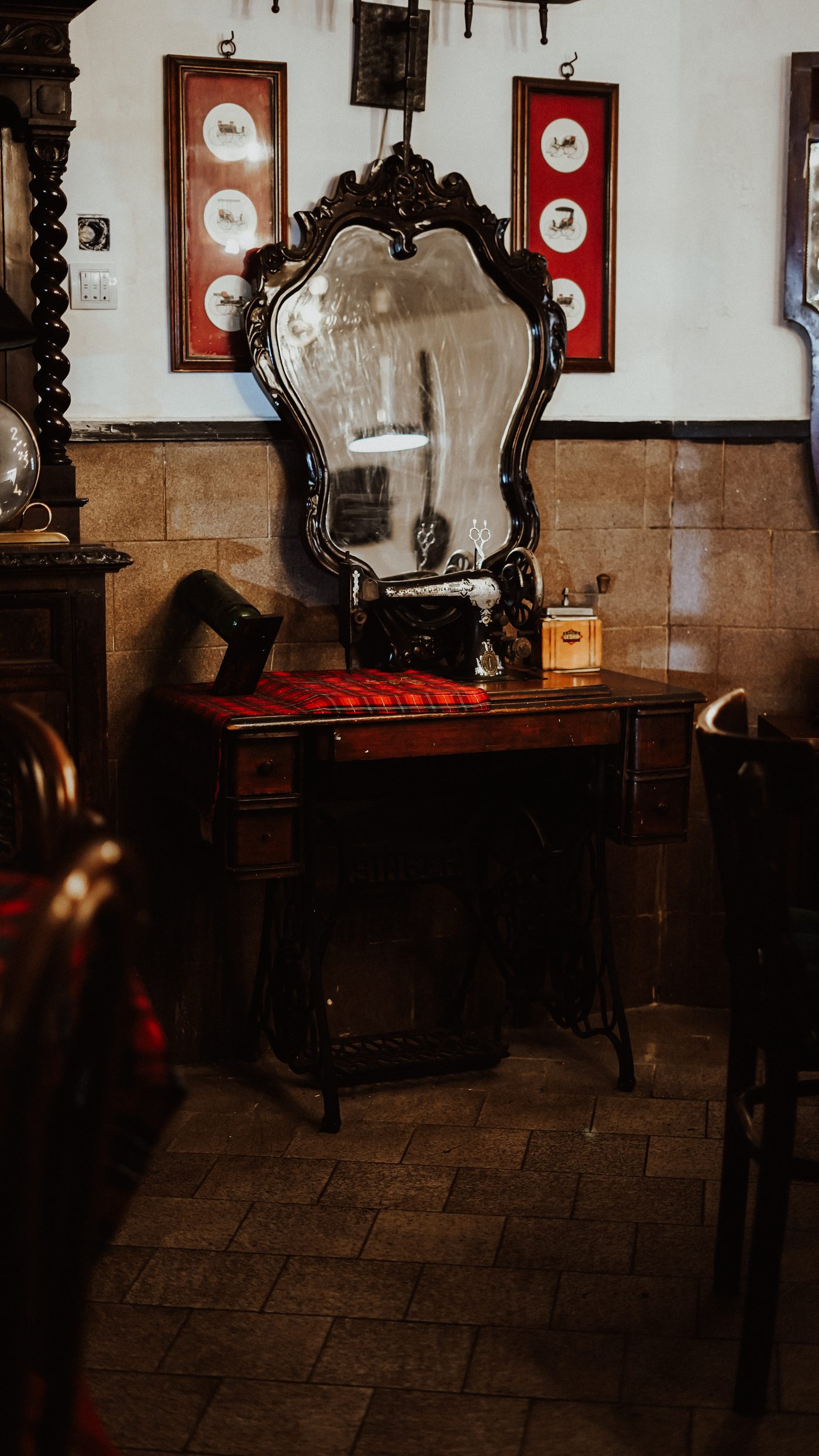 Antique mirror and sewing machine decor