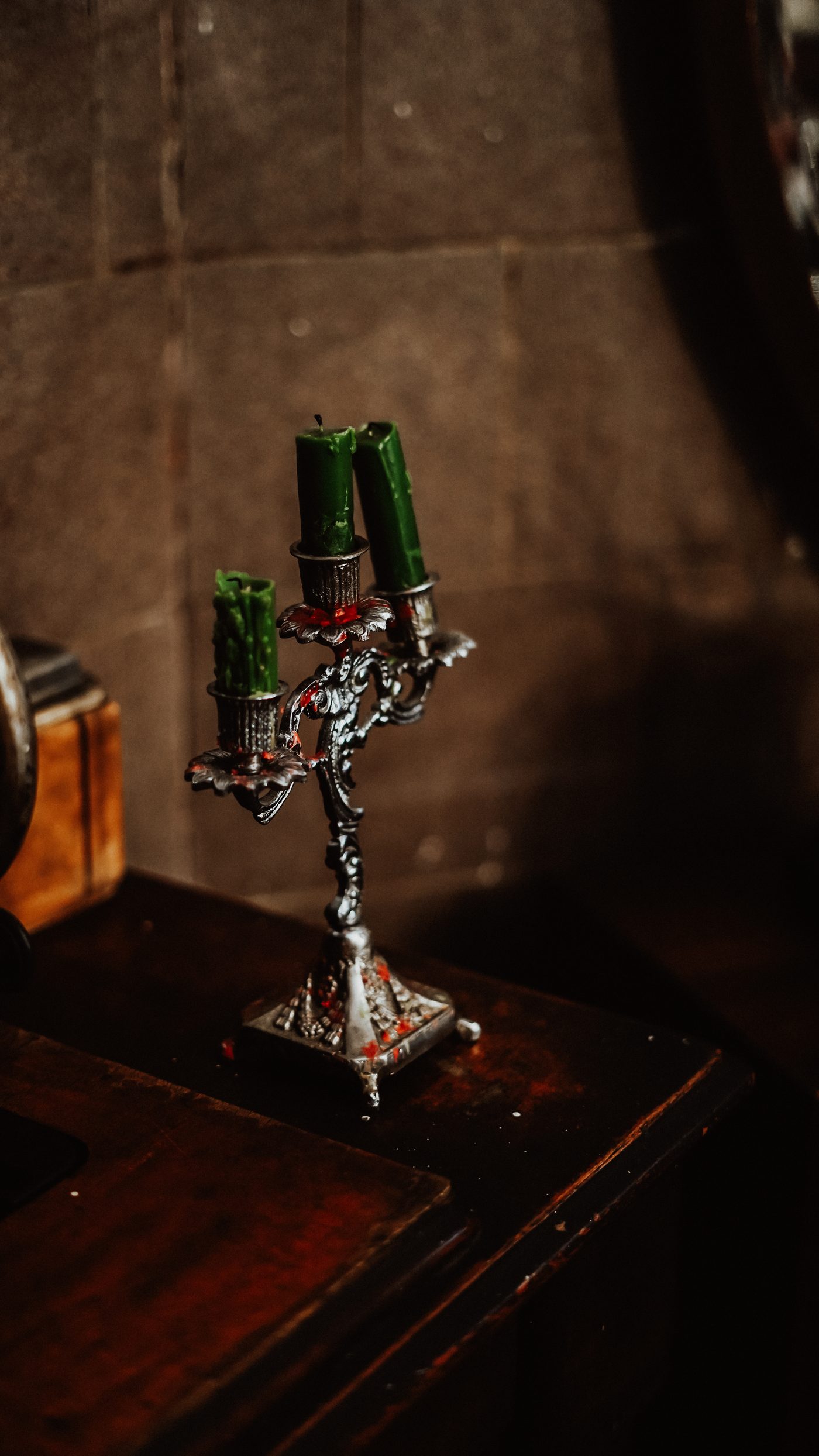 Gothic candelabra with green candles