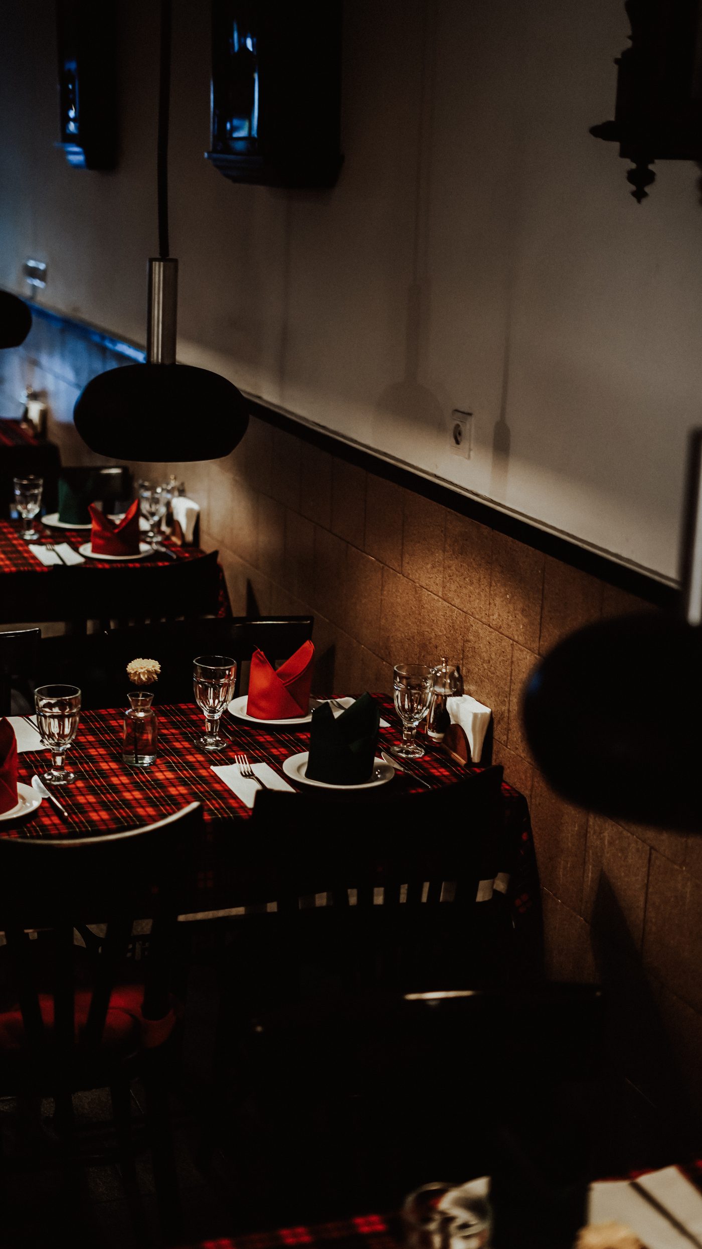 The Kilt dining room with tartan tablecloths and candlelight